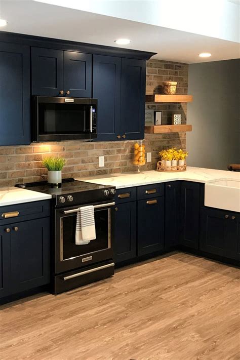 blue cabinets with black stainless steel appliances|kitchen white cabinets blue walls.